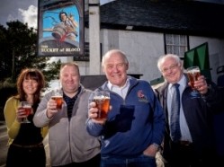 Left to right: Alannah Wagstaff (Phillip Shackelton’s daughter), Phillip Shackelton (son to Rick), Rick Shackelton and Ken Ascott, area manager for St Austell Brewery