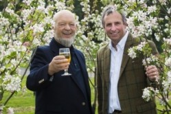 Glastonbury founder Michael Eavis (left) and Thatchers MD Martin Thatcher celebrate the new deal