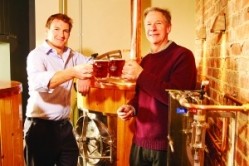 Tom Davies, chief executive of Brakspear (left) raising a glass with Malcolm Mayo, brewer at the Bell Street Brewery