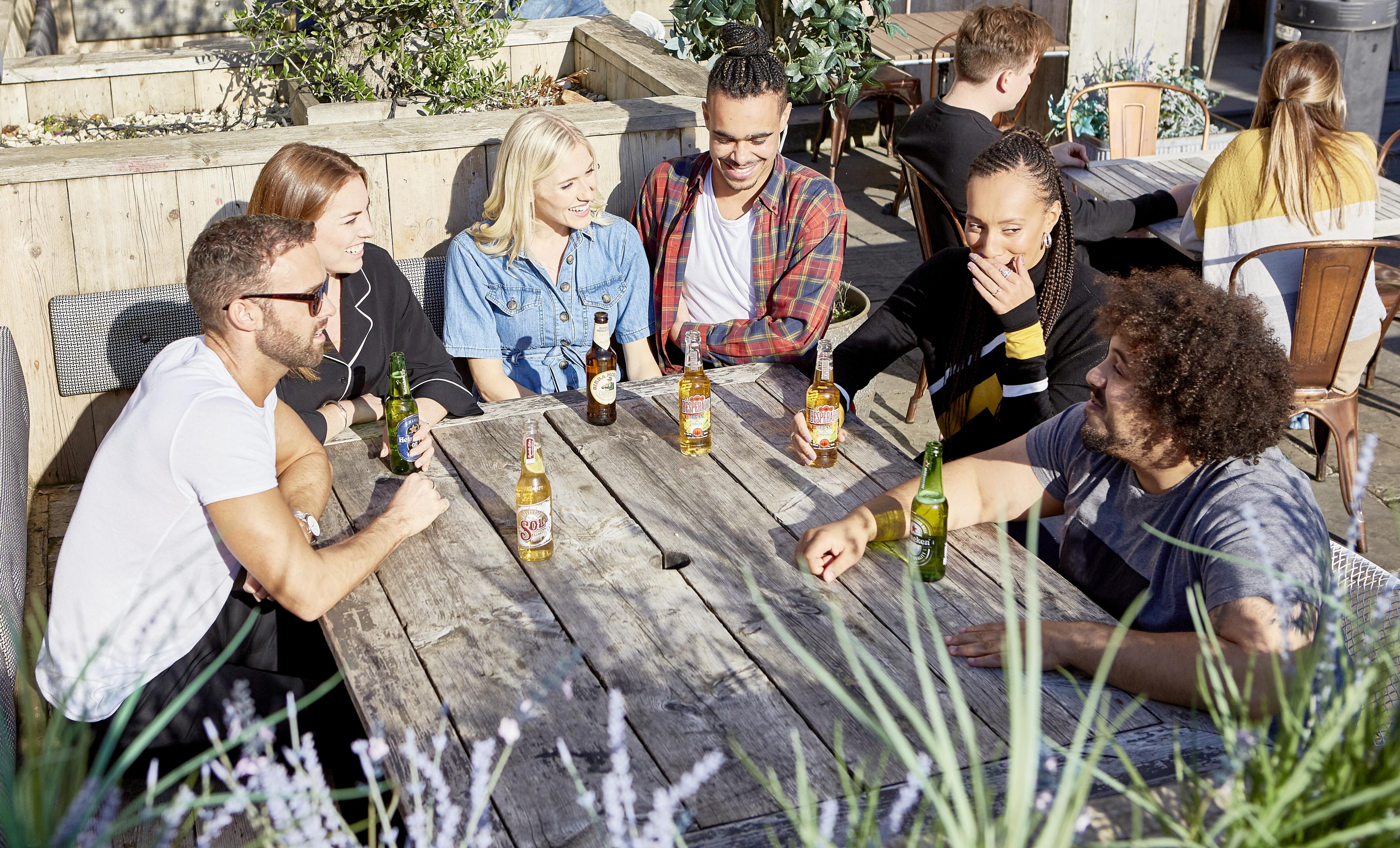 Heineken drinks in a pub garden