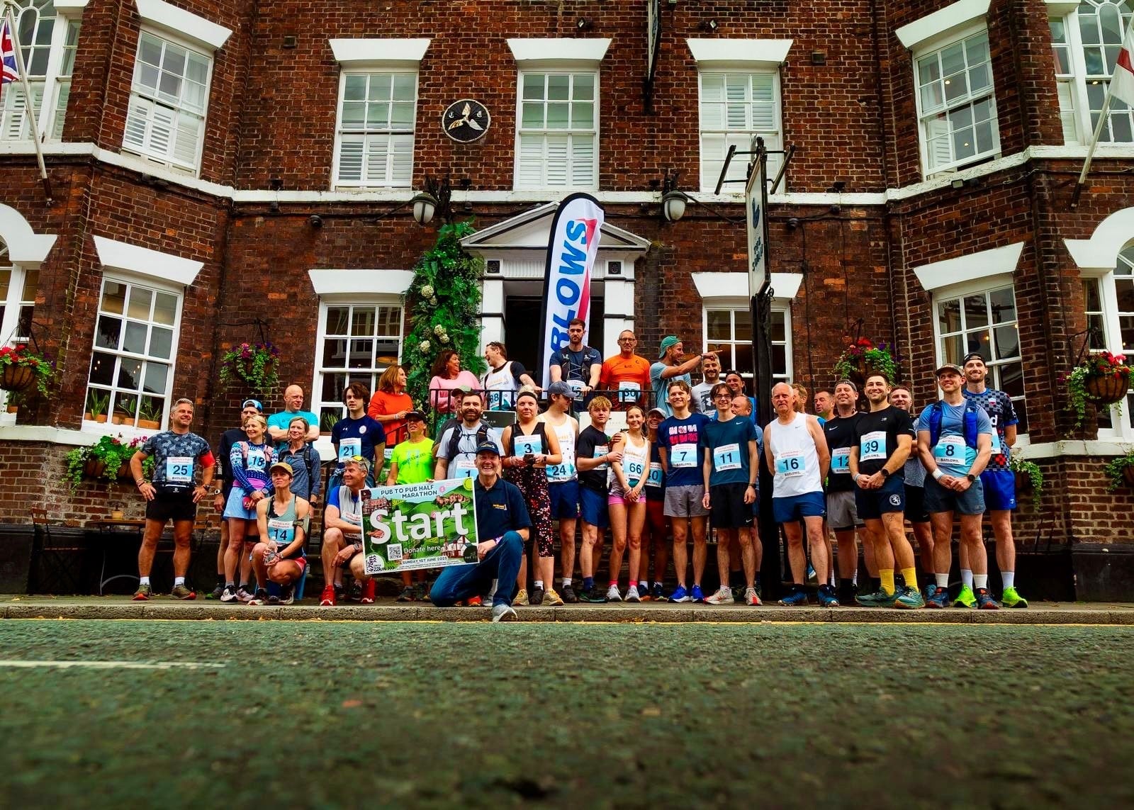 Runner gathering at the start of the run at the Swan, Tarporley