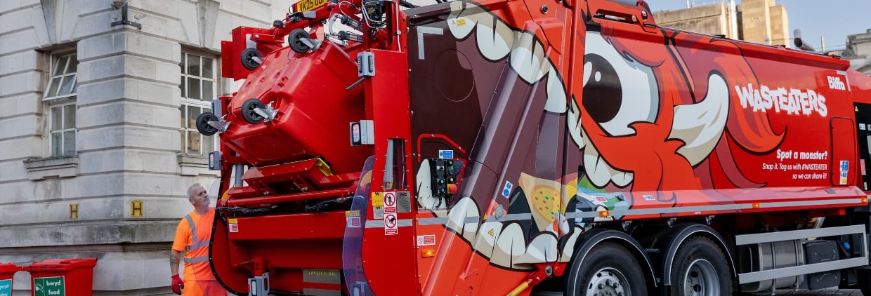 Biffa waste truck emptying a wheelie bin