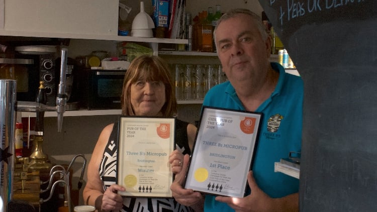 Mark-and-Cheryl-with-certs.jpg
