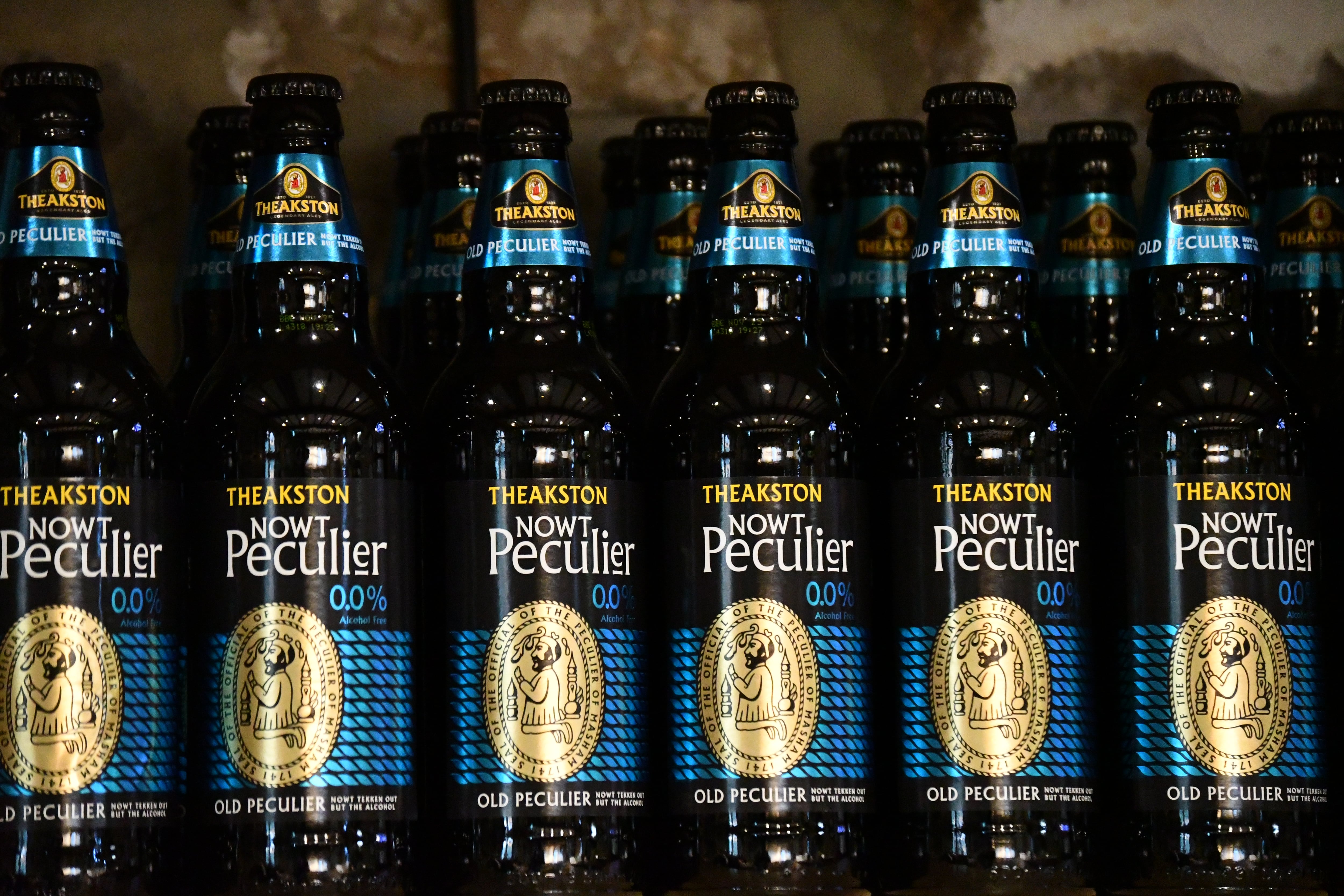 Several bottles of Theakston's Nowt Peculier ale