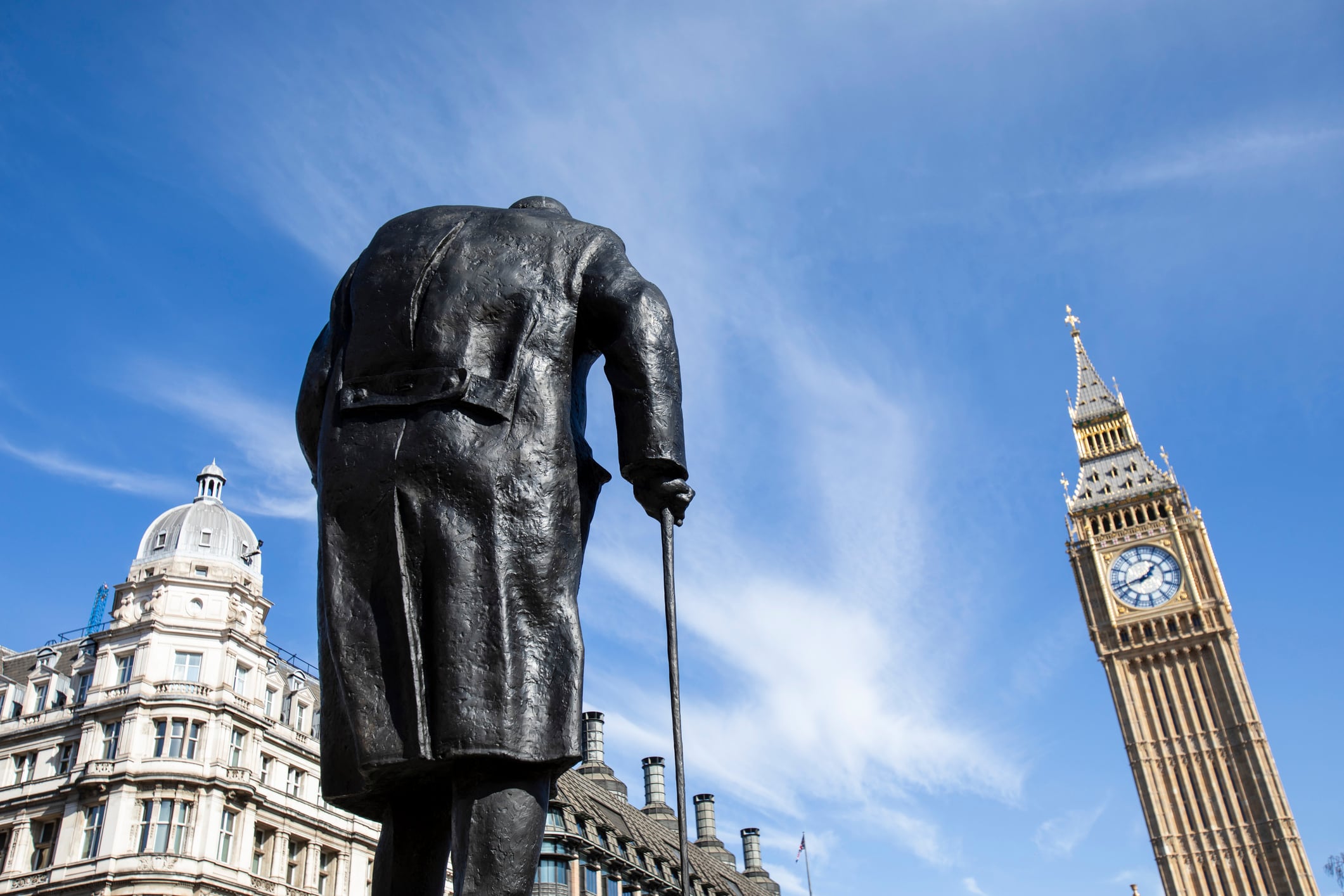 Winston Churchill statue looking towards Big Ben clock tower