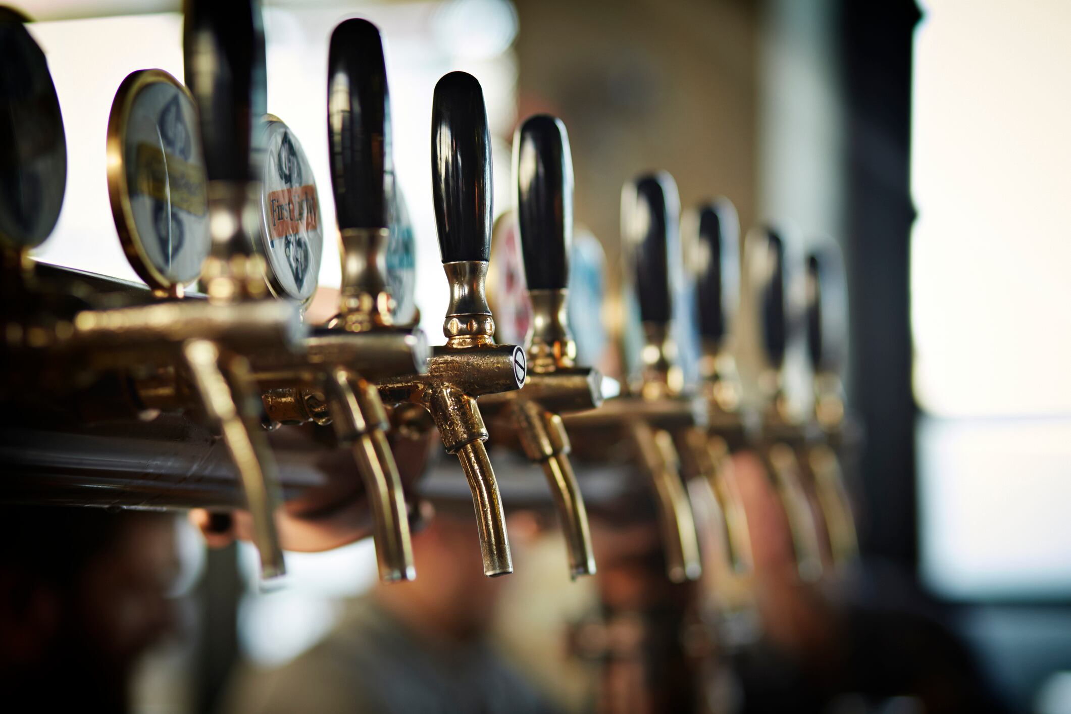 Close-up of beer taps at microbrewery