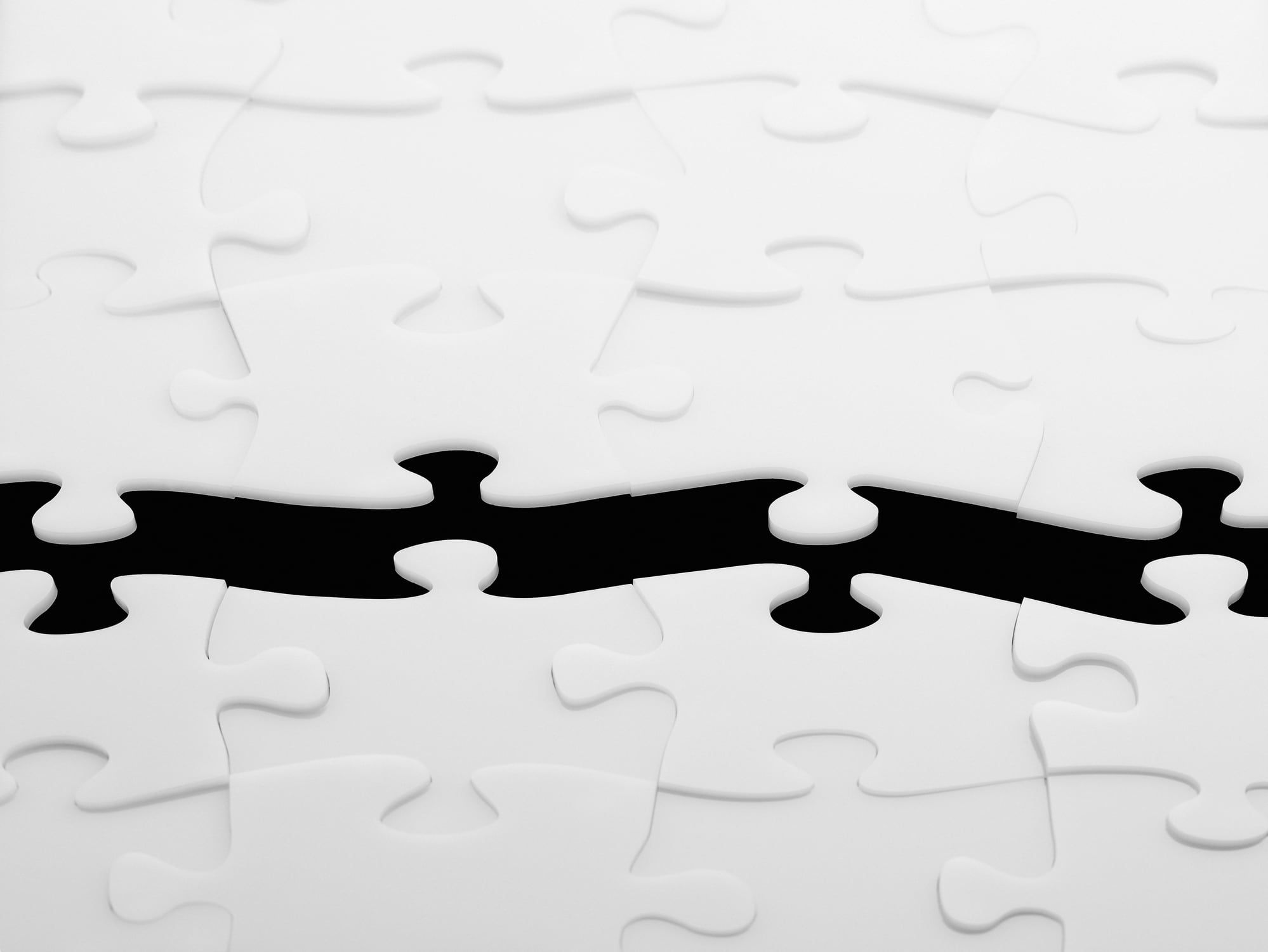 Puzzle pieces indicating business acquisition plans