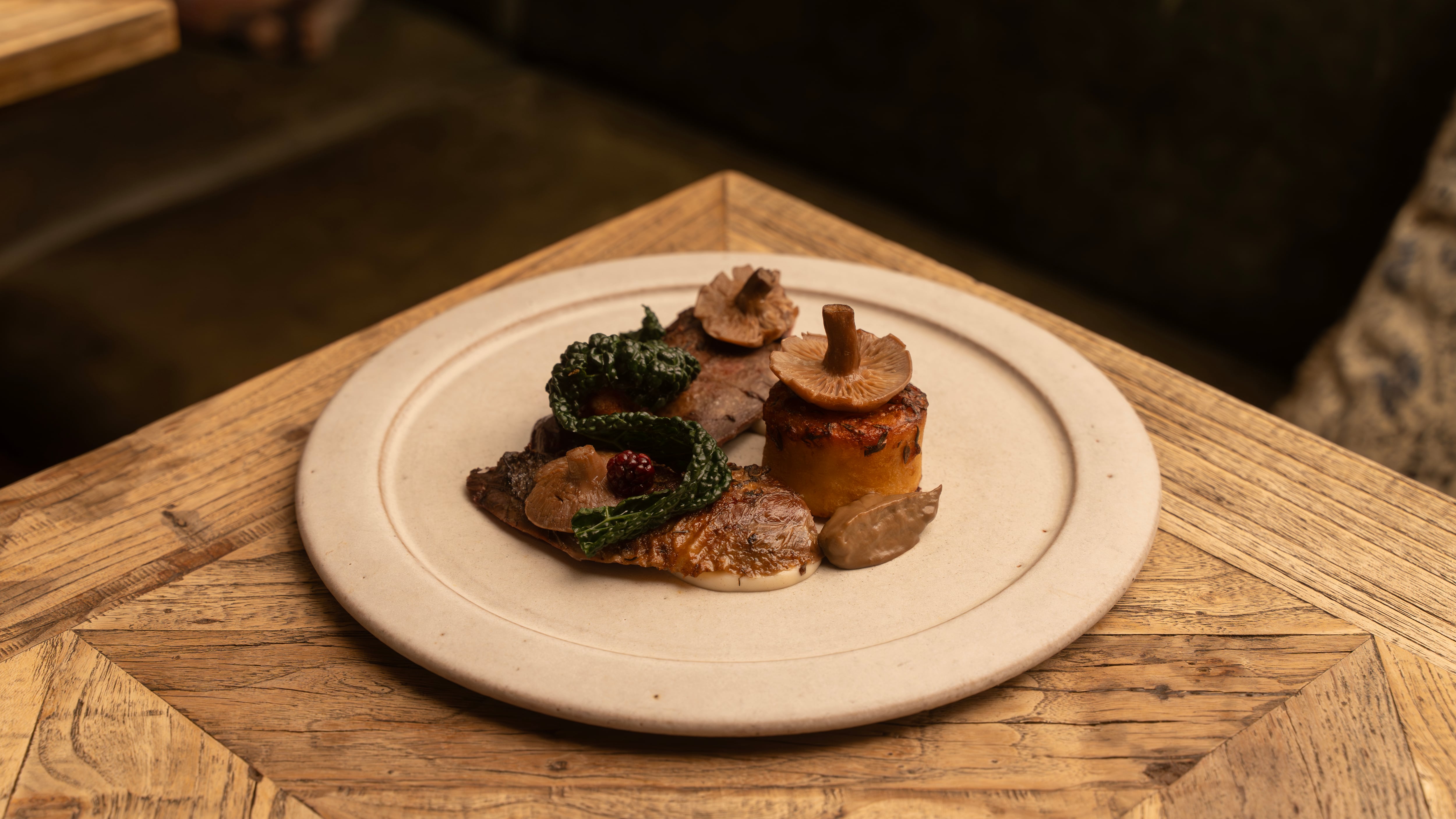 The Kirkstyle Inn_Grouse Breast and Faggot, Blackberry, Blewit, Fondant Potato, Bread Sauce and Cavolo Nero_ Credit_ Joshua Greenwood