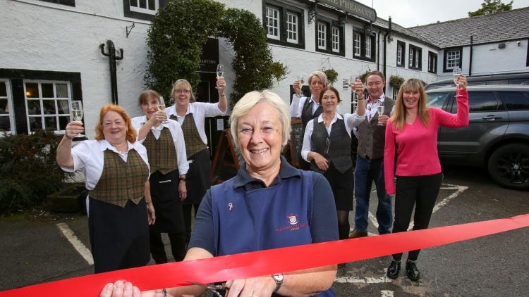 RESIZEDHead.housekeeper.Gillian.Gaston.opens.The.Pheasant.Inn.at.Bassenthwaite.Cumbria.jpg
