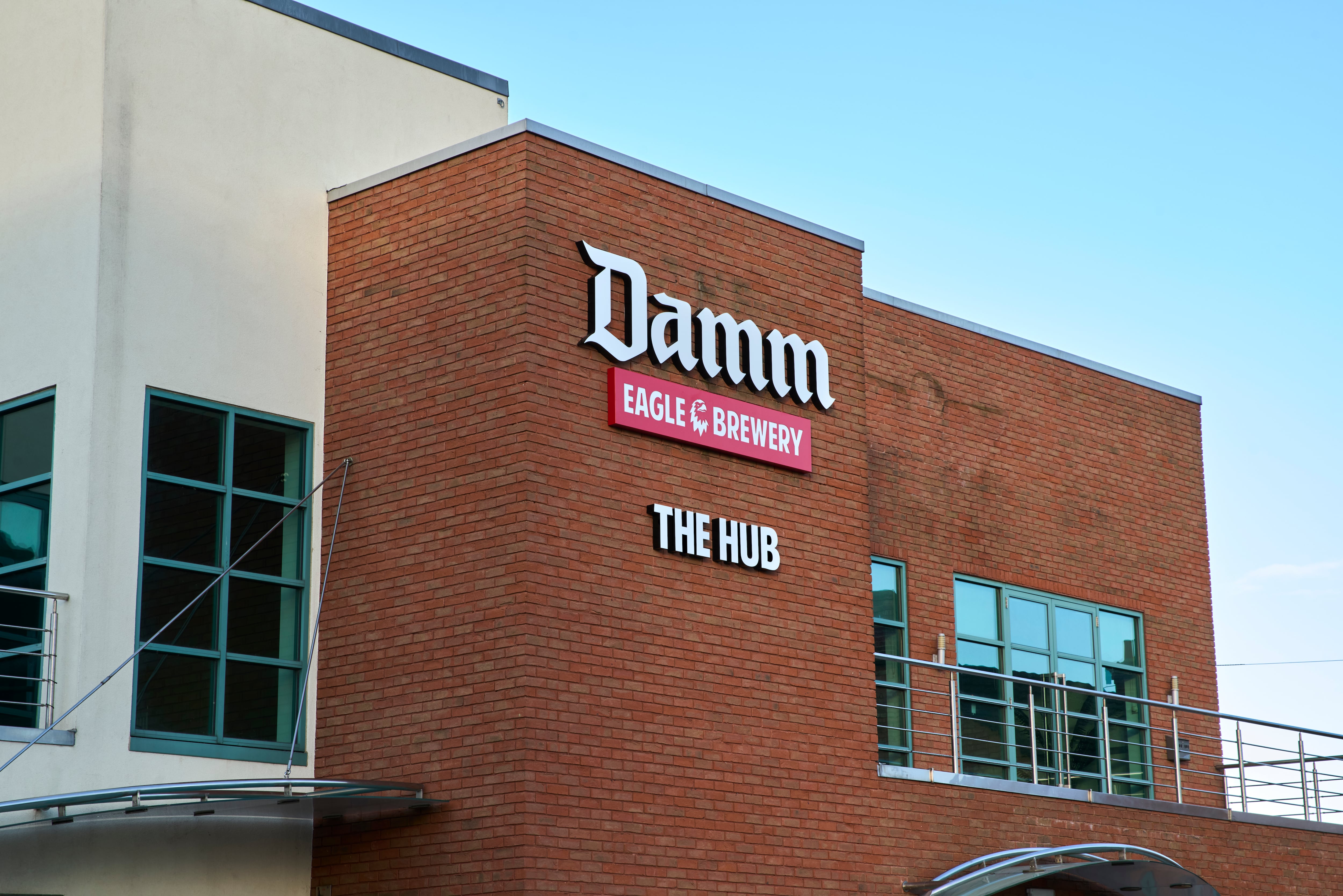 Exterior view of the modernised Damm Eagle Brewery in Bedford, featuring new brewstream and canning line following £70m investment.