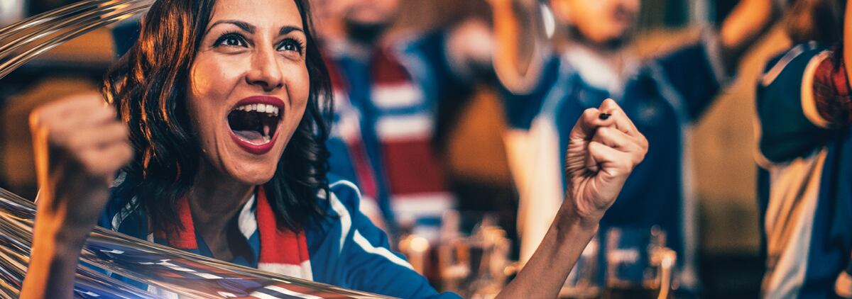 Woman cheering at sport