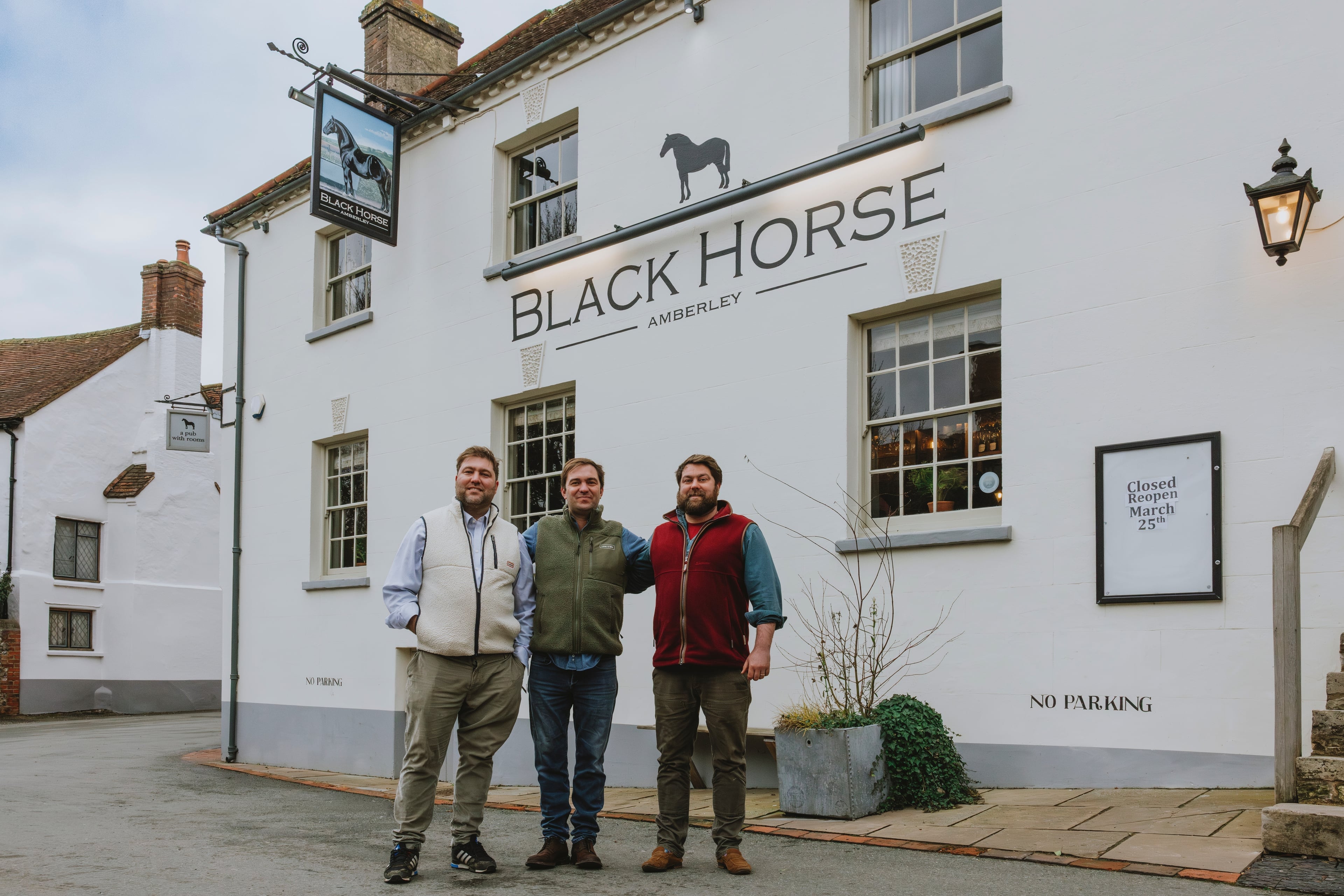 The Gladwin brothers outside The Black Horse in Amberley