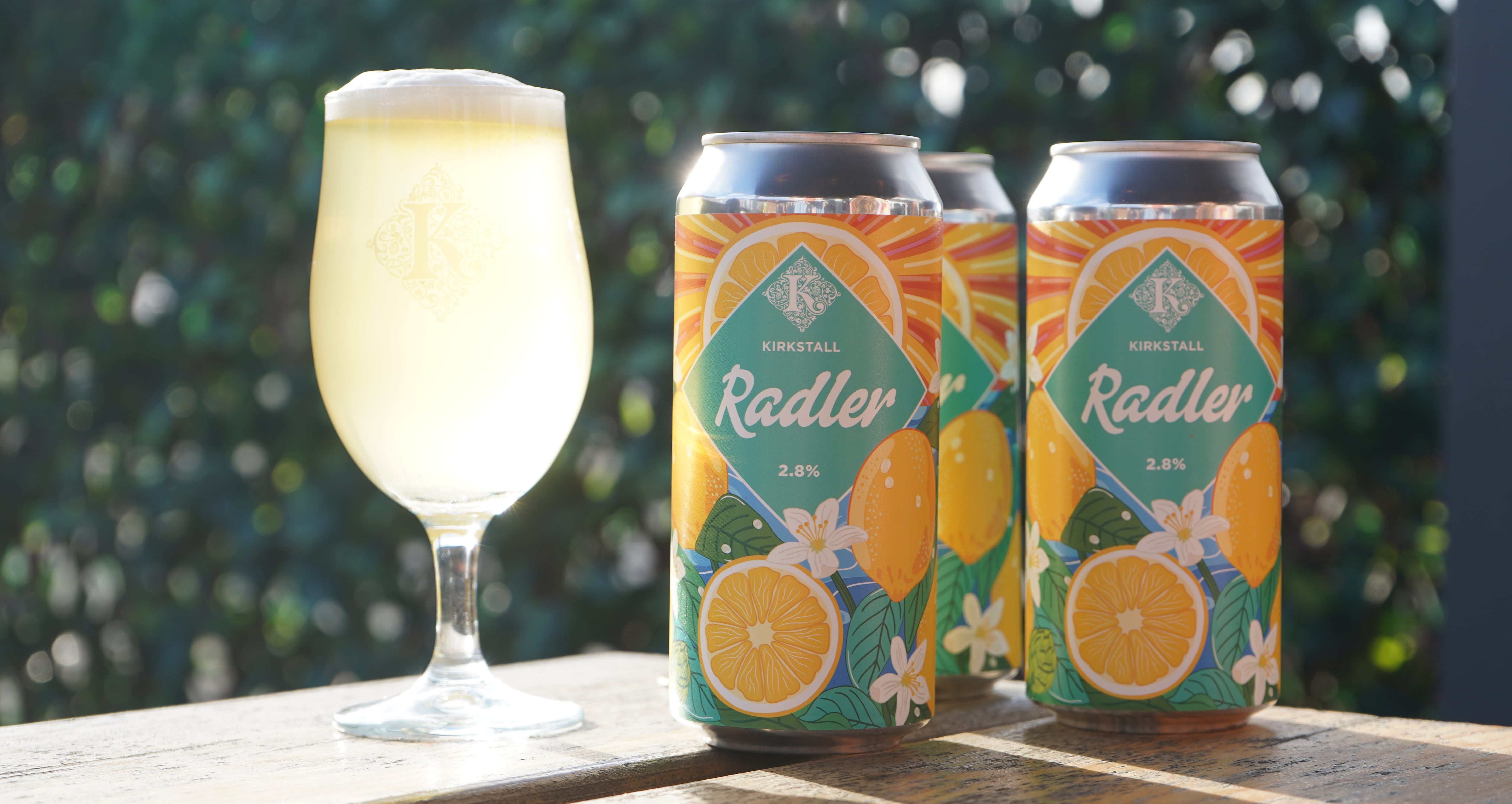 Kirkstall Radler in cans and poured in glass