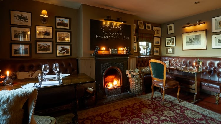 Duncombe-interior-fire-and-tables.jpg