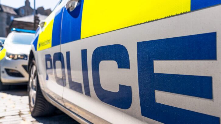 Police attend protest at Crooked House site