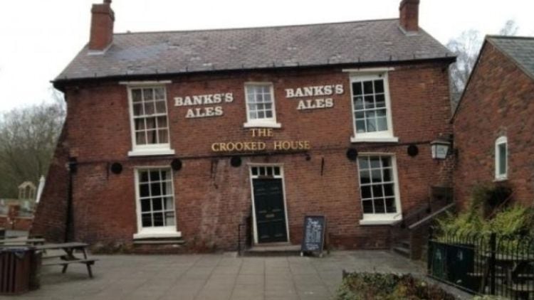Two-men-arrested-on-arson-suspicion-over-Crooked-House-fire.jpg