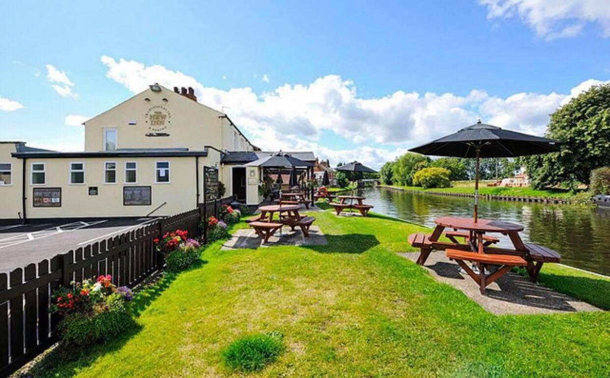 Heartbreaking: The New Inn (pictured) before vandals destroyed the normally well-kept garden