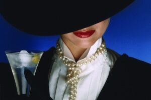 Woman-in-hat-drinking-G-and-T.jpg