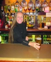 Janet.Dooner.serves.pint.at.the.Railway.Tavern