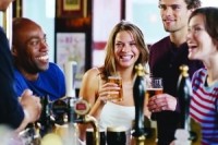 Group drinking beer in pub
