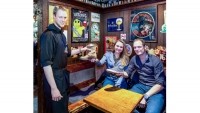 Customers at De Dulle Griet bar have to hand over a shoe before receiving a glass of beer