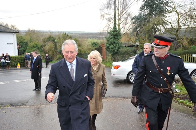 Prince Charles and Camilla walking to the Purleigh Bell