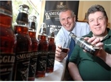 Roger Ryman (L) and Dave Moor open first few bottles of Smugglers Ale