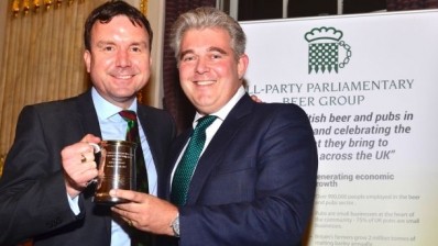 Political fortunes: MP Andrew Griffiths (left) receives his award from Brandon Lewis MP