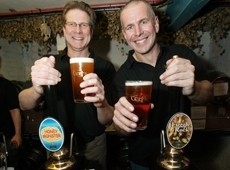 St Austell managing director James Staughton and head brewer Roger Ryman toast success