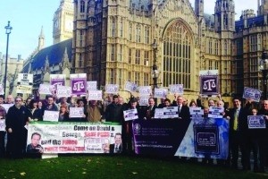 Campaigners celebrating the MRO vote outside Parliament last week