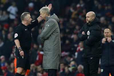 Arsene Wenger: the Arsenal manager is serving a four-game suspension for pushing an official