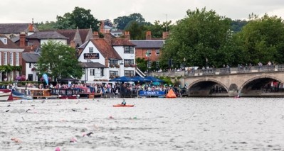 Swimmers near the Angel on the Bridge, finishing point for the Henley Club to Pub Swim 