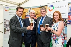Rupert Farquharson from Woodforde’s Brewery, John Longden from Pub is The Hub, Brandon Lewis, Community Pubs Minister and Emma Hibbert from Adnams and Chair of the Pub is The Hub in East Anglia