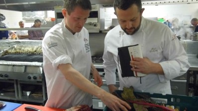 Young chef contestant Robert Yuill explains his recipe to judge Paul Dickinson