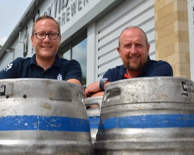 Increased demand: Simon Webster (right) says the brewery is running at 100% capacity