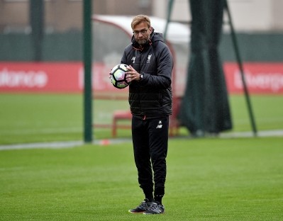 Klopp of the world: Liverpool's manager will hope his side are still in the top four at 5pm on Sunday