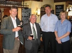 Bob Neill (centre, left): Community Pubs Minister has promised review