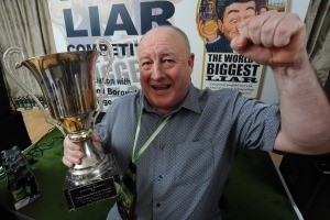 George Kemp with his World's Biggest Liar trophy