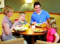 Whitbread: family enjoying table service