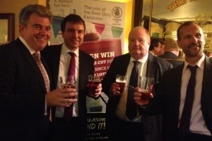 Celebration: (left to right) community pubs minister Brandon Lewis, All-Party Parliamentary Beer Group chair Andrew Griffiths, Secretary of State for Communities and Local Government Eric Pickles, and CAMRA chief executive Mike Benner