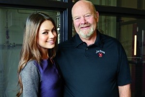 Mila Kunis, the new face of Jim Beam, with master distiller, Fred Noe (right)
