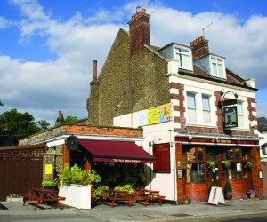 Price concerns:  Phil Rice, of the Old Wheatsheaf in Enfield, Middlesex, doesn't understand cost of Strongbow at his pub