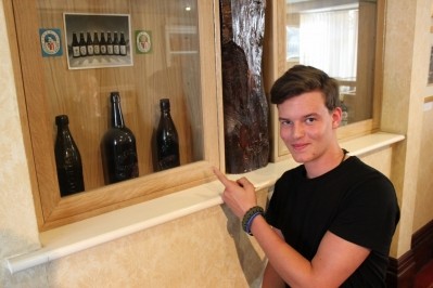 Malachi Swaine with his beer bottle (far right), on display in Shepherd Neame’s visitor centre
