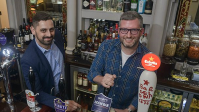 Cheers: new publicans Ed Clifton (right) and Lukasz Adamczyk toast the new-look Brunel