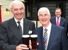 Longden (R) toasts launch with Councillor John Jowers