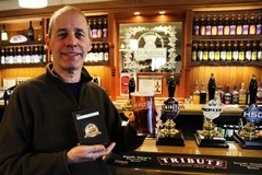 Mike Bunting celebrates at the Hicks bar at St Austell Brewery 