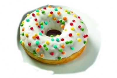 Otis Spunkmeyer's Rainbow Crunch Donut: A light and airy doughnut frosted and dipped in coloured sugar sprinkles