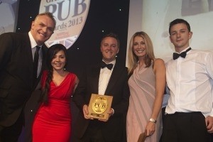 Tom Gee (centre) of the Red Lion Inn, Cricklade, picked up the award for Best Freehouse and the overall Great British Pub of the Year title