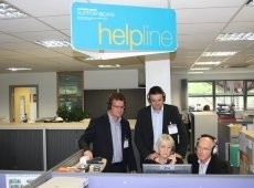 From left: Gordon Thomson, Gareth Jones and David Wills of Heineken UK Ltd with Kath Gill on the helpline at Licensed Trade Support & Care. 
