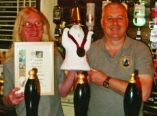 Winners: Brian Dourish. left, and Garry Hewitt of the Quakerhouse, Darlington CAMRA's Pub of the Year seven times.